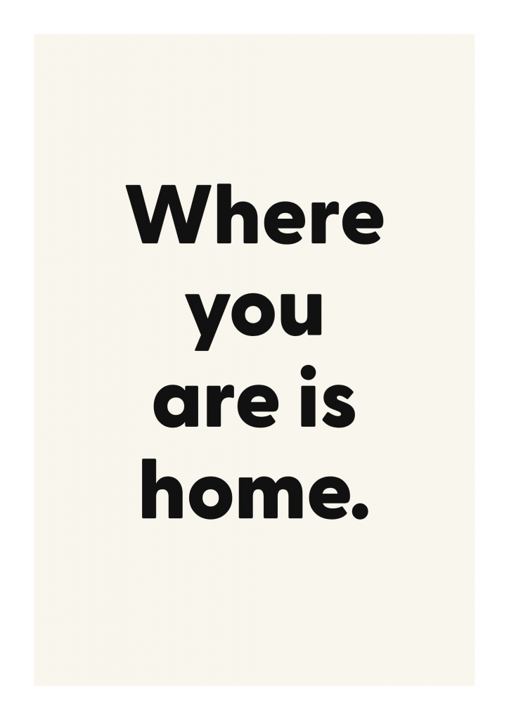 Where you are is home. family and home quote poster with warm typography on ivory background