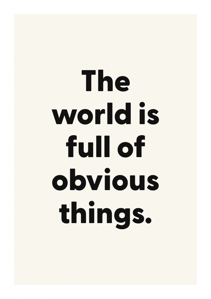 The world is full of obvious things. motivational quote poster with positive typography on ivory background